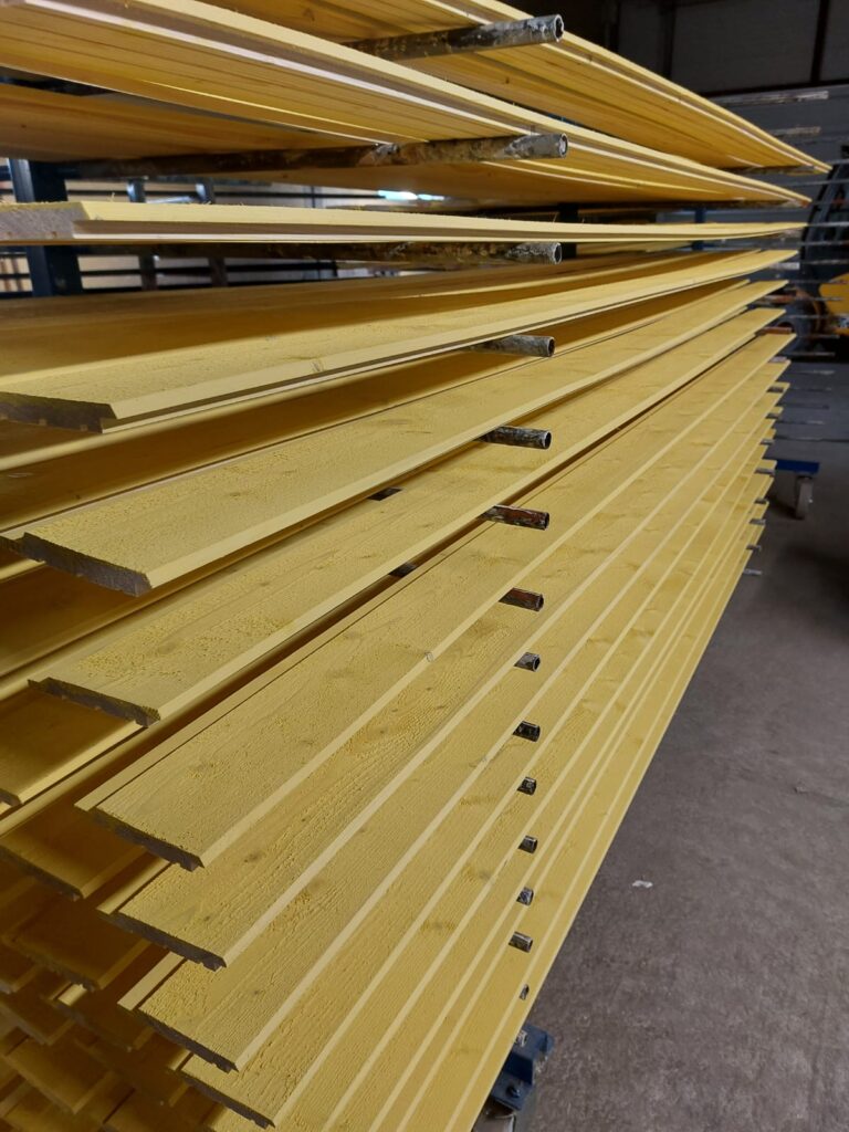 Industrially painted exterior cladding